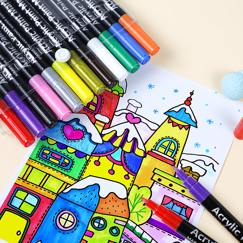 Colorful acrylic paint pens with a partially colored illustration of a cartoon city.