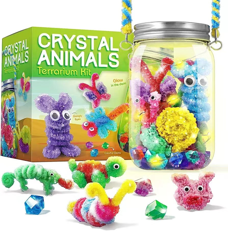 Crystal Animals Terrarium Kit with colorful creatures and a jar filled with items, next to its packaging.