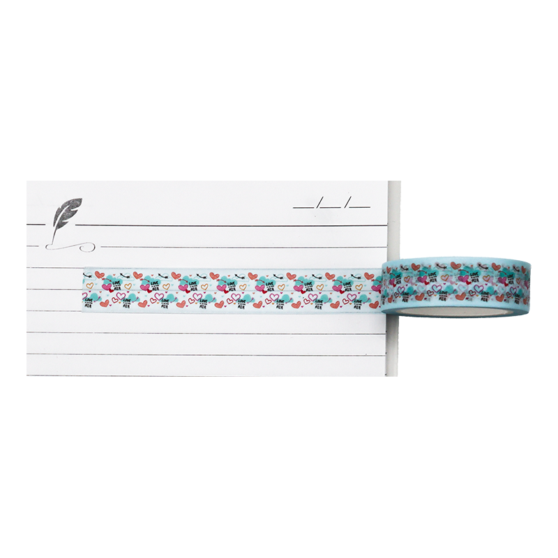 A colourful washi tape with hearts, arrows, and the phrase LOVE IS IN THE AIR.