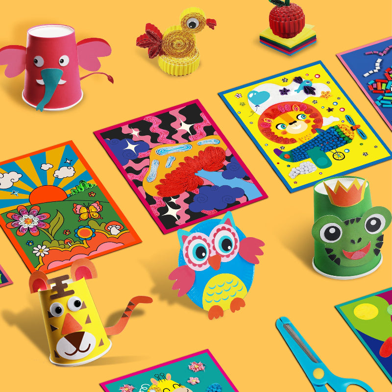 Selection of completed paper crafts including paper cup animals, quilled paper birds and apples, 3D paper art, and safety scissors.