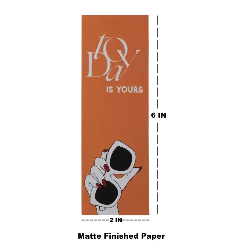 Bookmark with 'IQ Da' branding and a hand holding sunglasses on matte finished paper.