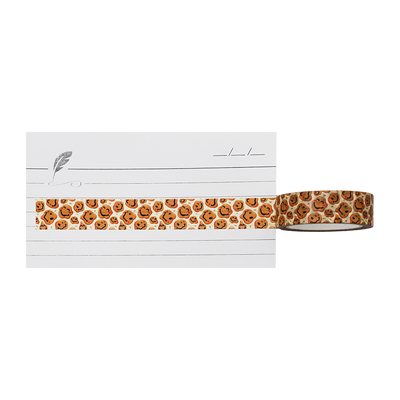 This charming washi tape features a delightful, repeating pattern of happy, brown cookies with cheerful, hand-drawn smiley faces. 