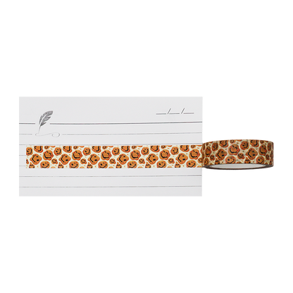 This charming washi tape features a delightful, repeating pattern of happy, brown cookies with cheerful, hand-drawn smiley faces. 