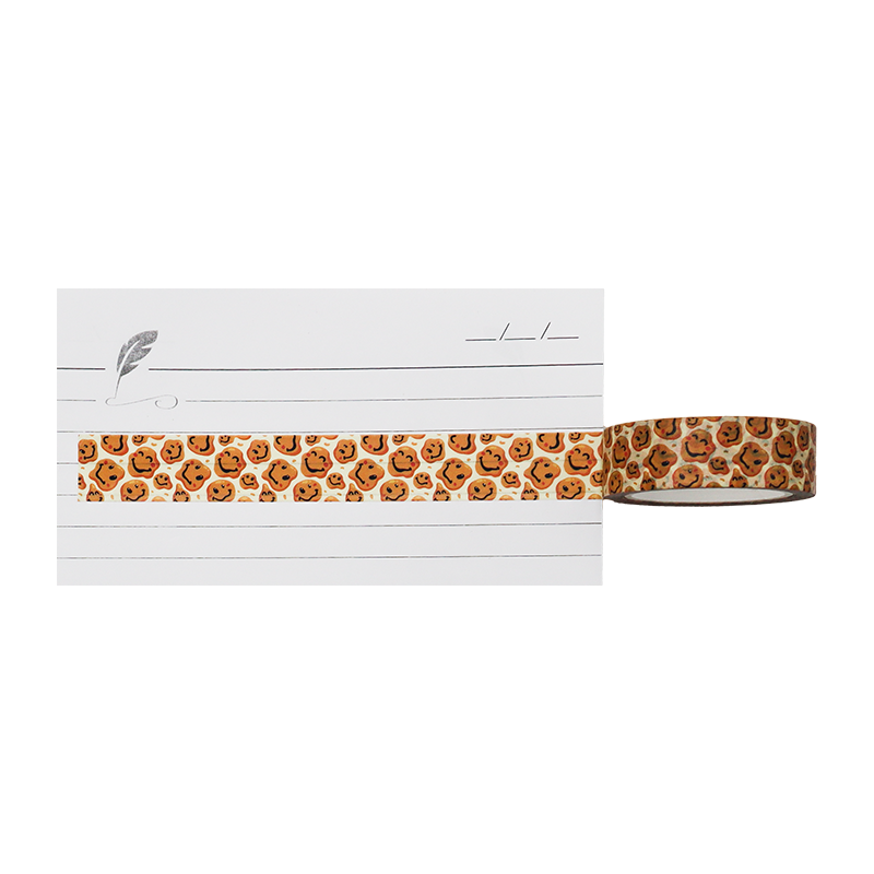 This charming washi tape features a delightful, repeating pattern of happy, brown cookies with cheerful, hand-drawn smiley faces. 