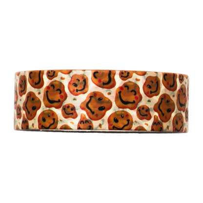Sweeten up your crafting projects with this adorable Smiley Face Cookies Washi Tape.