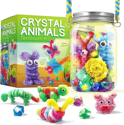 Crystal Animals Terrarium Kit with colorful creatures and a jar filled with items, next to its packaging.