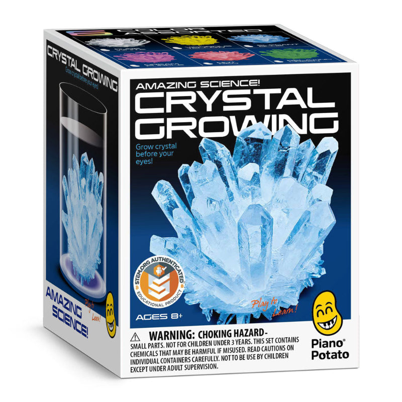 Box of Piano Potato crystal growing kit with blue crystals and warning label.