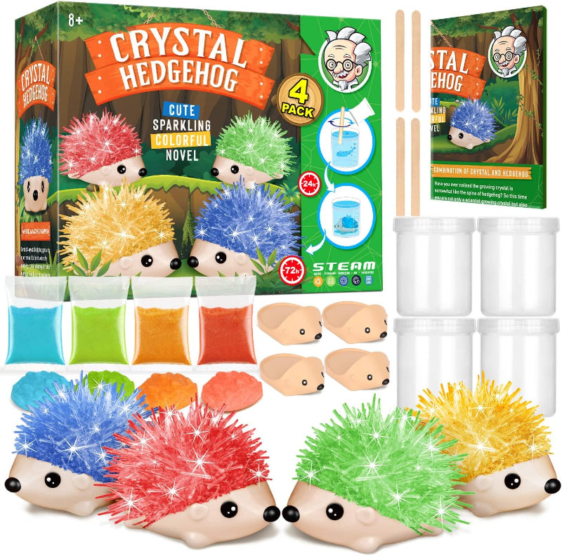 Product packaging for the 4-pack Crystal Growing Hedgehog Kit showing four colorful crystal hedgehogs, powder packets, containers, stirrers, and instruction booklet.