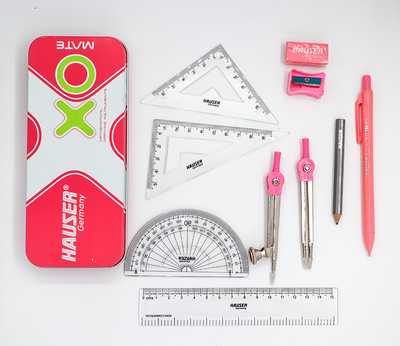 Collection of stationery items including rulers, protractor, compass, pencil, and eraser on a white background with HAUSER branding.