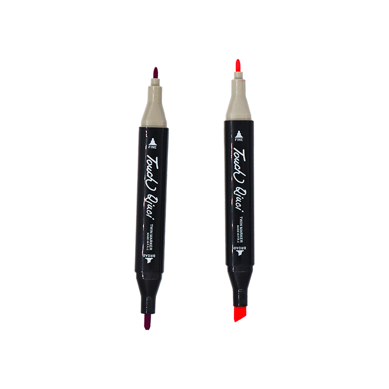 Two dual-tip markers with red and black caps on a white background