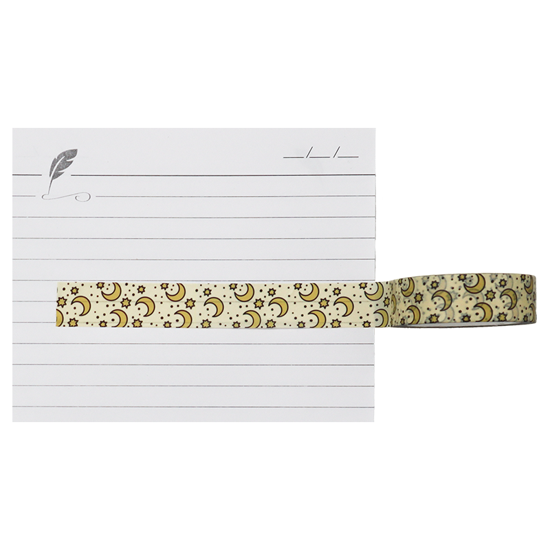 A beautiful washi tape with pattern of crescent moons and stars in gold and yellow tones.