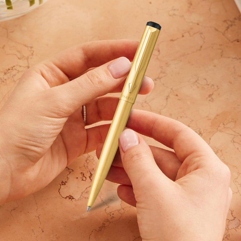 Top view showing gold-plated clip and sleek cap design