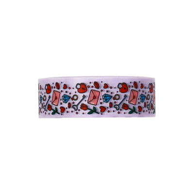 A delightful pattern of keys, lockets, roses, and diamonds on Washi tape