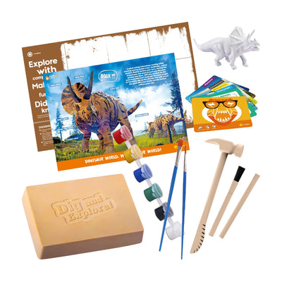 A comprehensive view of the Triceratops 2-in-1 Activity Kit including a plaster dig block, white dinosaur figure, six paint pots, excavation tools, and educational study cards.